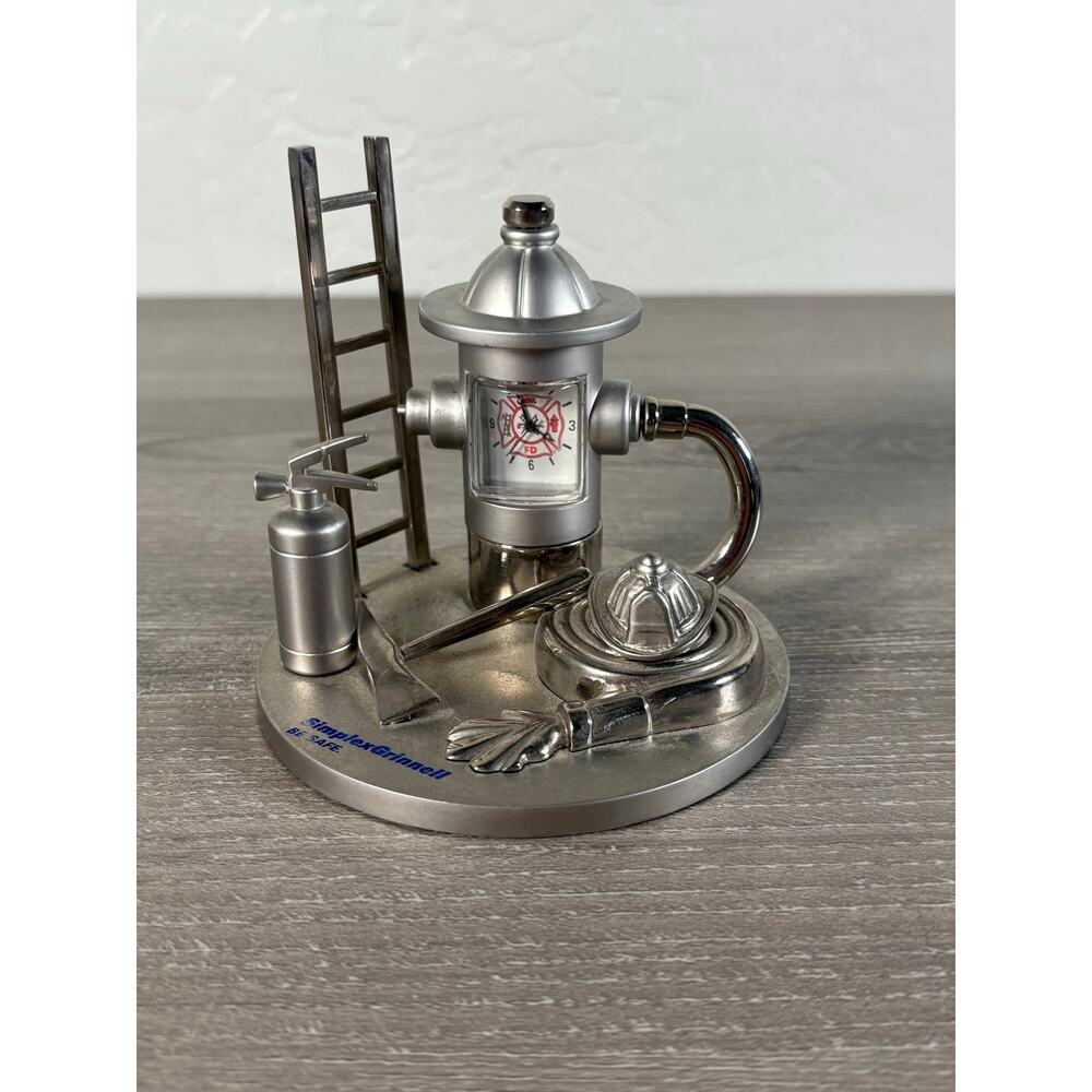 Silver‎ Metal Fireman Equipment Desk Collectable Clock- Excellent Condition